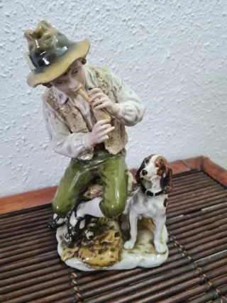 Figura porcelana antigua J. Armani