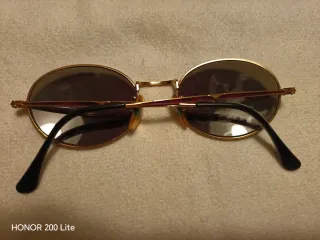 Occhiali da sole oro e rossi