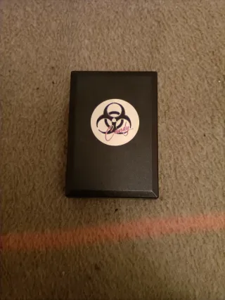 Colgante First Aid Spray Resident Evil