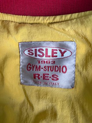 Chaqueta universitaria Sisley roja y amarilla