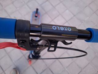 Patinete Oxelo azul y rojo