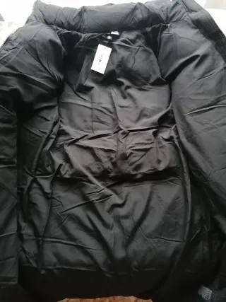 Abrigo largo acolchado negro H&M