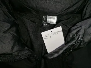 Abrigo largo acolchado negro H&M