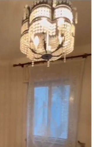 Lampadario di cristallo e metallo