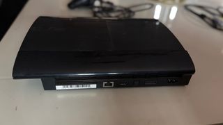 PS3 Sony con caja, juegos y mando