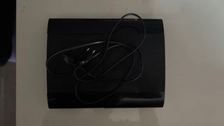 PS3 Sony con caja, juegos y mando