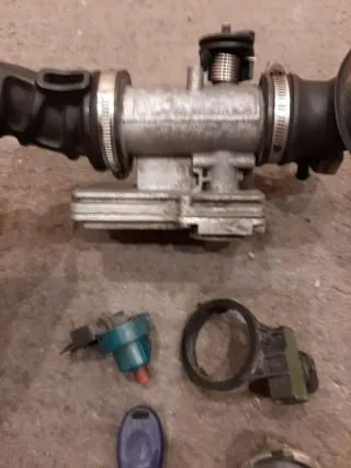 Cuerpo mariposa e inyector Vespa 125LX CM160011