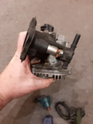 Cuerpo mariposa e inyector Vespa 125LX CM160011