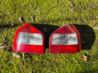 Pilotos traseros Audi A3 8L