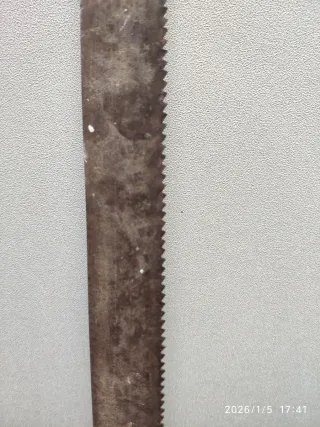 Sierra de carpintero antigua