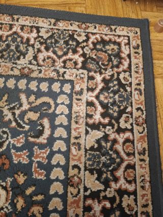 Alfombra estilo persa azul y marrón