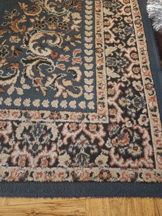 Alfombra estilo persa azul y marrón