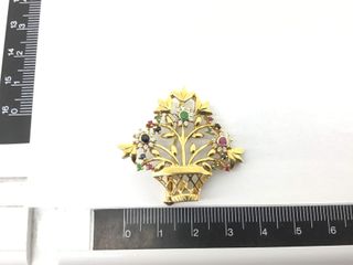 broche oro 18k con piedra