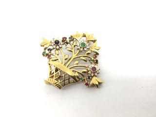 broche oro 18k con piedra