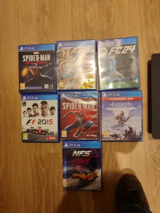PS4 + Mando + Cargador + 7 Juegos