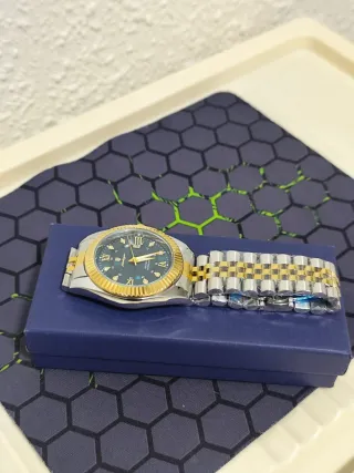 Reloj poedagar Hombre Oro y Plata