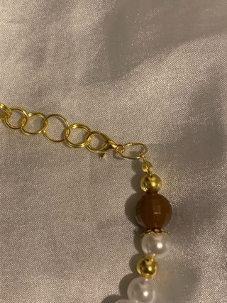 Bracciali perline artigianali oro e bianchi