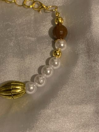 Bracciali perline artigianali oro e bianchi