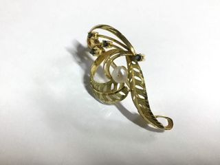 broche oro 18k con piedra