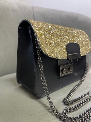 Nuova Pochette vera pelle Made in Italy nero/oro