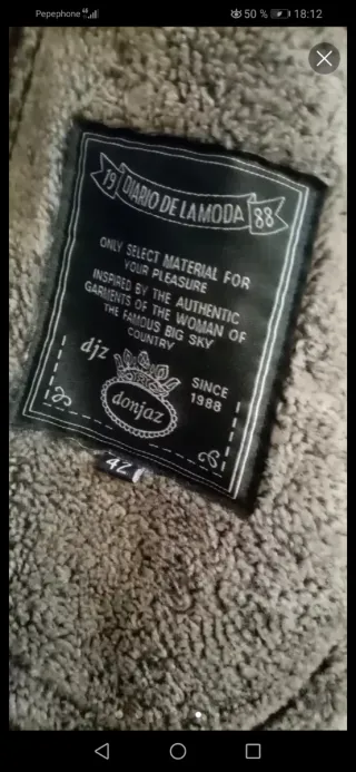 Abrigo efecto piel con borreguito