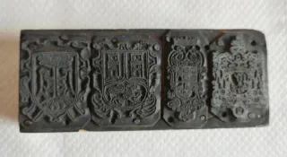 Clichés de imprenta antiguos con 9 escudos .