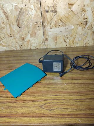 Televisor antiguo verde con radio AM/FM