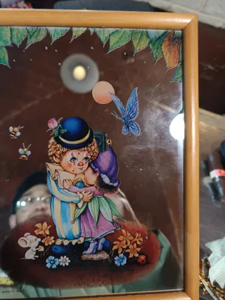 Specchio con cornice in legno e stampa