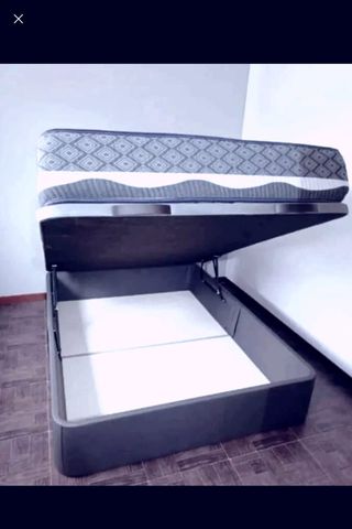 Canapé cama blanco con cabecero