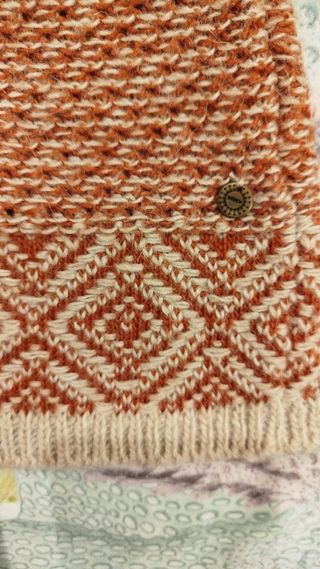 Chaqueta de punto naranja y beige