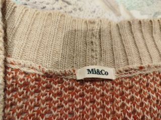 Chaqueta de punto naranja y beige