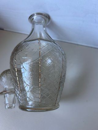 Botella antigua de cristal con tapón