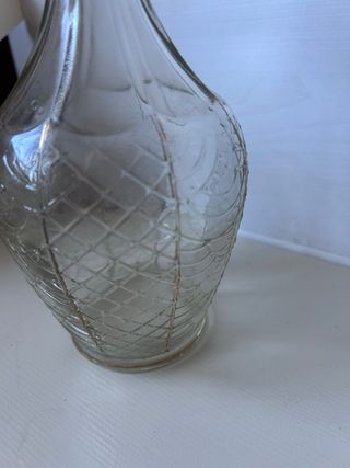 Botella antigua de cristal con tapón