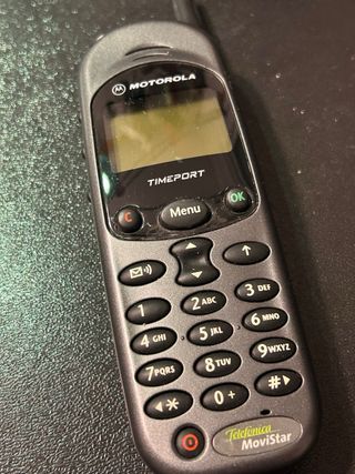 Teléfono Motorola Timeport Tribanda Gris