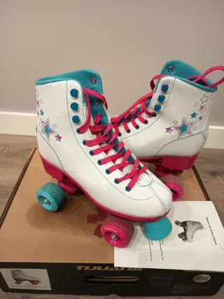 Patines 4 ruedas blancos y rosas