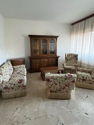 Poltrona floreale con frange