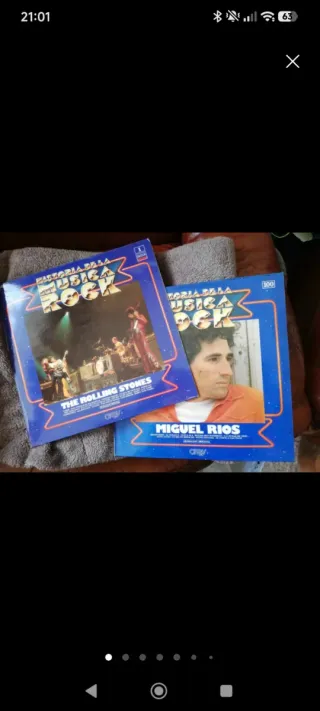 100 lps + 6 libros 'HISTORIA DE LA MÚSICA ROCK'.