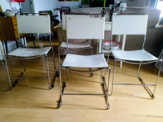 Conjunto de 4 sillas acero inox piel