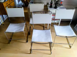 Conjunto de 4 sillas acero inox piel