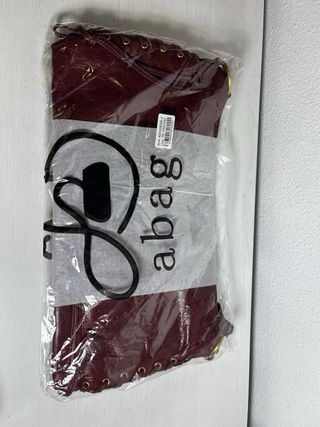 Bolso de mano burgundy con trenzado