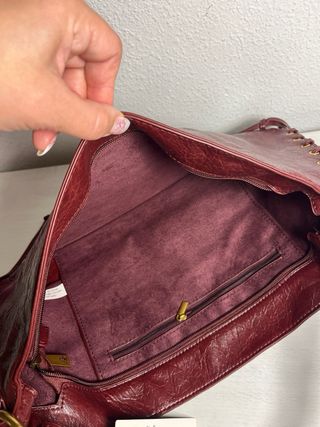 Bolso de mano burgundy con trenzado