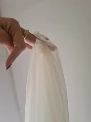 Vestido novia. Corsé, falda de corte sirena y velo