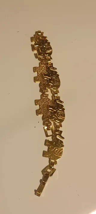 Pulsera chapada en oro con elefantes