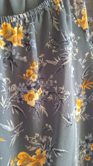 Blusa floral manga acampanada