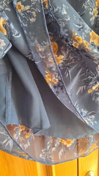 Blusa floral manga acampanada