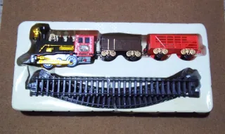 Tren de juguete con vagón de carbón