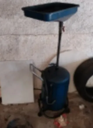 Extractor de aceite con depósito