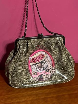 Bolso clutch dorado animal print Orval · Cadena ·