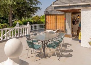 Mesa de jardín con 6 sillas