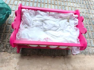 Bebe Antonio juan con cuna rosa